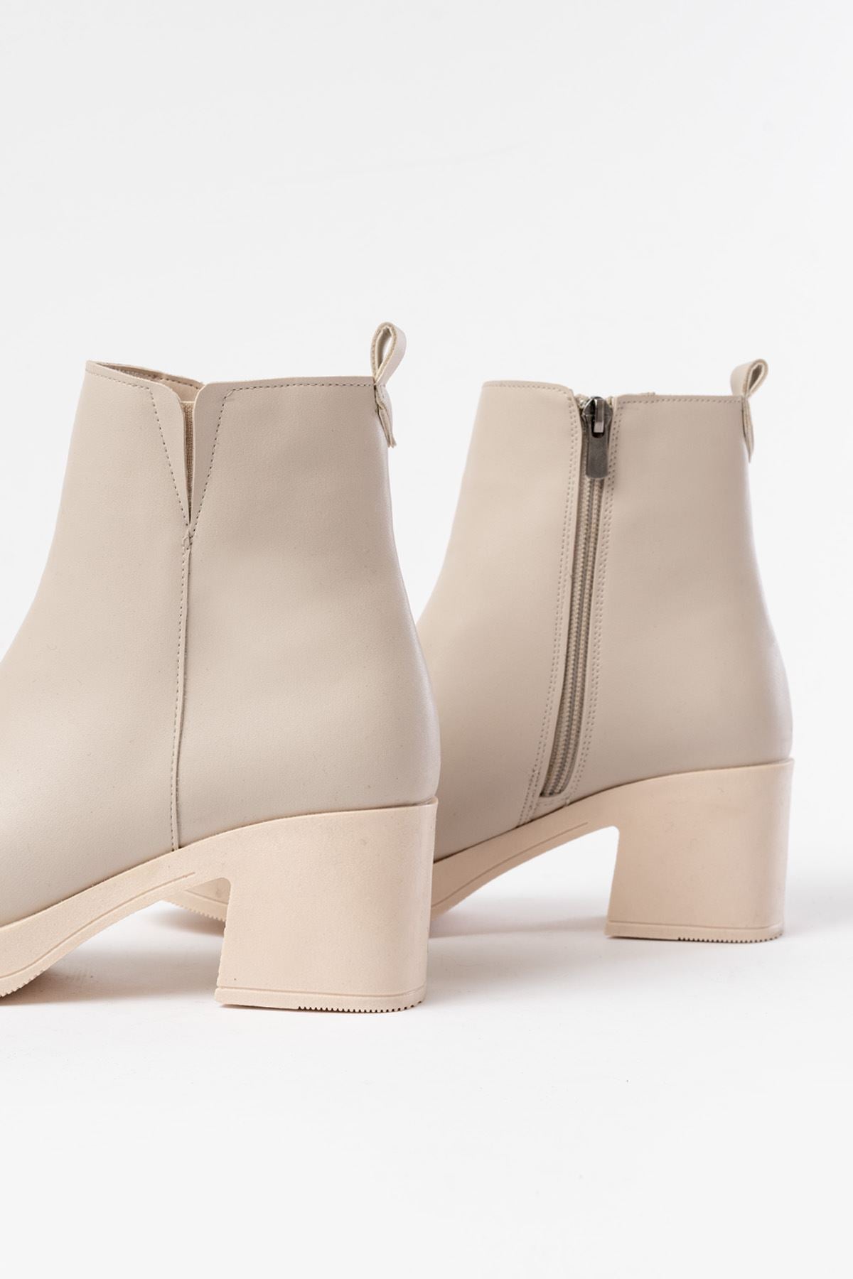 Nalgün Bej Lastikli Fermuarlı Kalın Topuklu Kadın Bot
